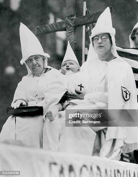 Cincinnati:Klanswomen At Great Ohio Rally. Here are shown the eldest and youngest members of the Klan who attended the great meeting here a few days...