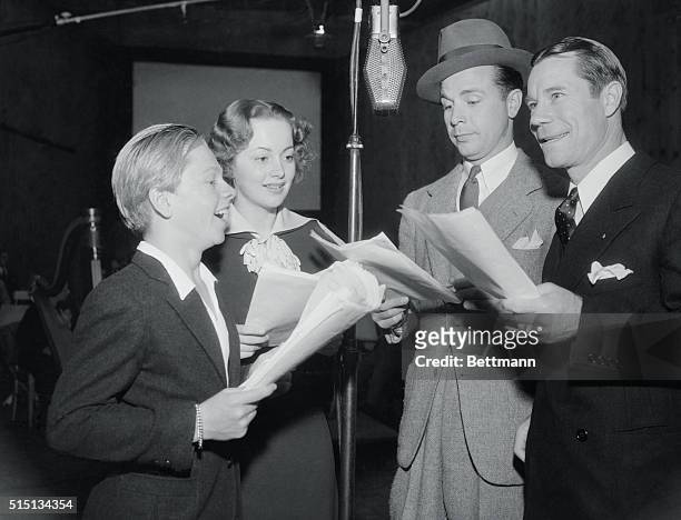 Film Stars at Broadcast. Under the microphone at the nation-wide broadcast from Los Angeles of A Midsummer Night's Dream by Warner Bros. Executives...