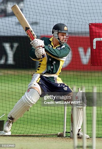 New Australian batsman Simon Katich goes through his final training session at Headingley in Leeds 15 August 2001 before the start of the fourth Test...