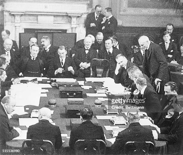 London, England- This exclusive photo shows the signatories of the great Locarno Peace Pact after the signing.
