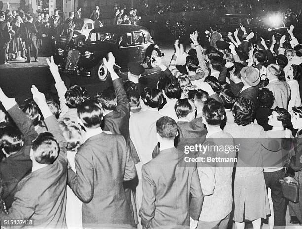 General Charles de Gaulle is cheered by crowds as he leaves Paris for his country home in eastern France, following his acceptance of a bid from...