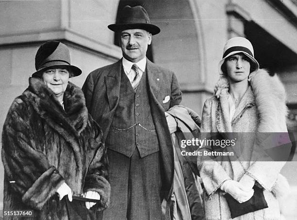 Giannini, wizard of finance, and his wife and daughter, Miss Claire Giannini, leaving from the Ferry Building in San Francisco for a six months trip...