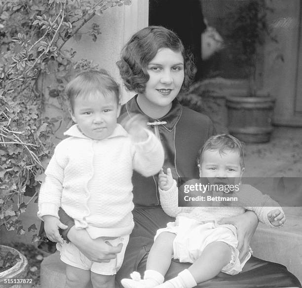 Family Separated From Charlie Chaplin. A very recent picture of Mrs. Lita Grey Chaplin, wife of Charles Spence Chaplin, with her two children, Sidney...
