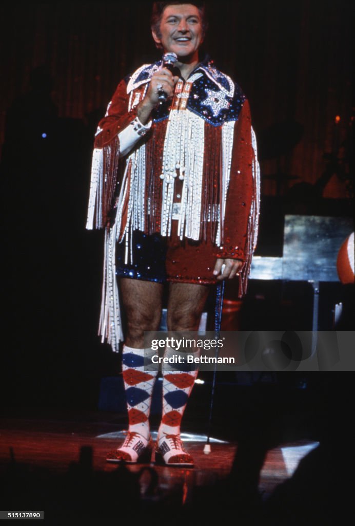 Liberace Liberace wearing hot pants costume, dances and sings through comedian ...