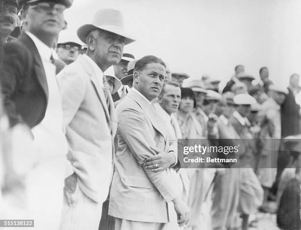 Bobby Jones in role of spectator at National Amateur golf play. Bobby Jones, third from left, is seen here cast in an unusual role, that of...