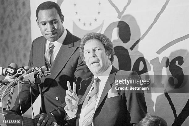 February 11, 1982 - Philadelphia: Philadelphia 76ers Darryl Dawkins looks on as Sixers' owner, Harold Katz gives a couple a reasons why the Sixers...