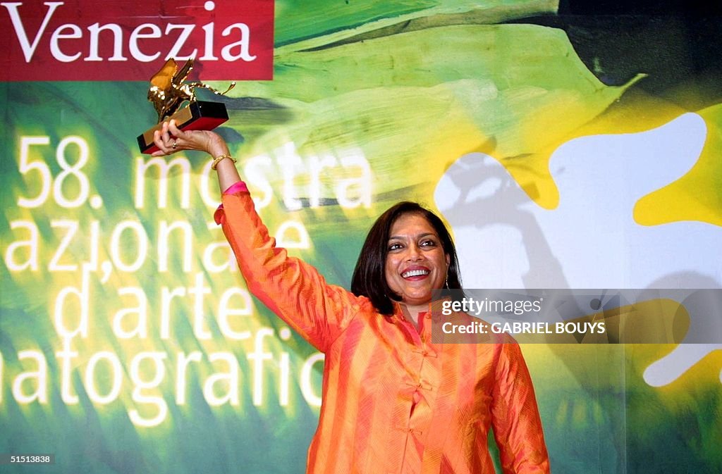 Indian director Mira Nair poses with the Golden Li