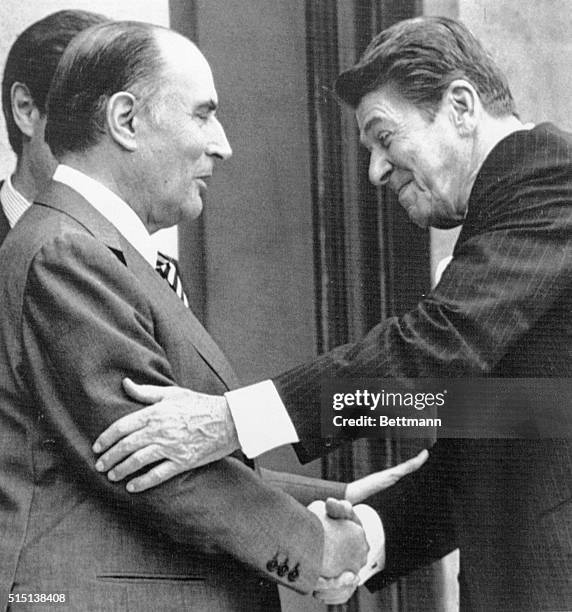 Paris: President Francois Mitterrand greets President Ronald Reagan arriving at the Elysee Palace for lunch and meeting. President Reagan is France...