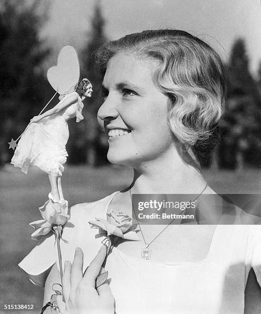 Fairy Queen of Tournament of Roses...A wave of the magic wand and presto, the Fairy Queen of Pasadena's Tournament of Roses assumes true fair size as...