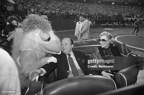 Ray Kroc, owner of the San Diego Padres and founder of the MacDonald's hamburger chain, is greeted by the San Diego chicken in honor of Kroc's 80th...