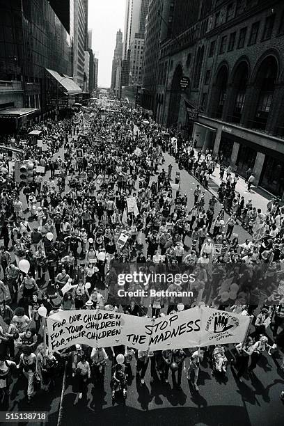 Thousands of World Peace marchers move en mass along 42nd Street en route to Central Park where some 500,000 anti-nuclear demonstrators were to...