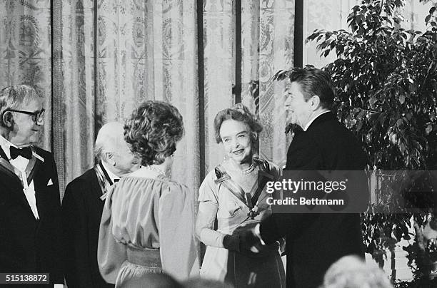 Washington: Film star Lillian Gish is greeted by president Reagan as the White House was filled 12/5 with a star-studded array of big names from the...