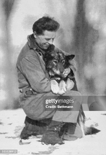 Shelburne, Vt.: Leonhard Seppala and his dog Togo pictured shortly before their 300 mile dog sled trip to Nome, Alaska in 1925. Togo was lead dog on...