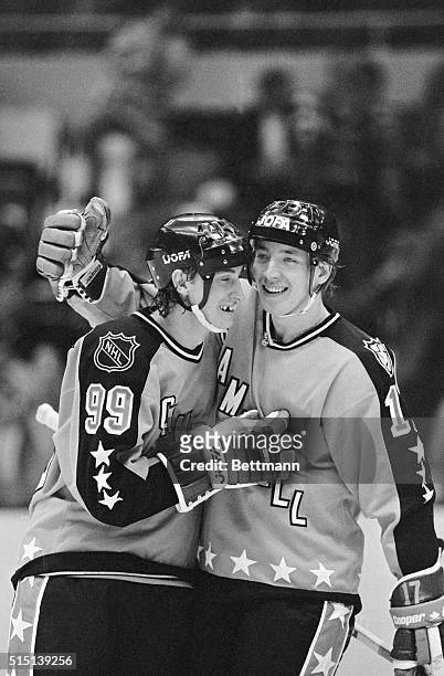Campbell's Wayne Gretzky of Edmonton is hugged by teammate Jari Kurri after he scored his fourth goal in the third period of the game 2/8. Gretzky...
