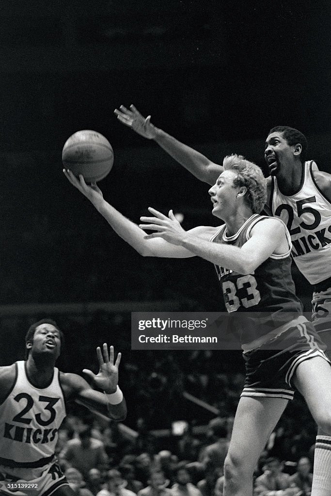 Bill Cartwright Reaching Past Larry Bird for Basketball