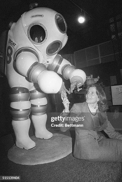 Marine Botanist Sylvia Earle Sitting by Submersible Suit
