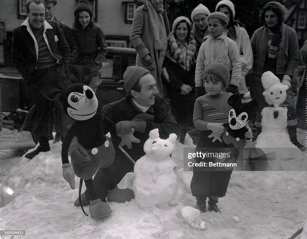 Walt Disney Judging Mickey Mouse Snowman Building Contest
