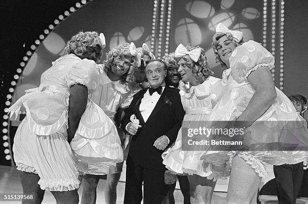 Shirley Temple look-alikes singing a medley of "Good Ship Lollipop" on NBC's Bob Hope's All Star Super Bowl Party" are from left to right Lawrence...