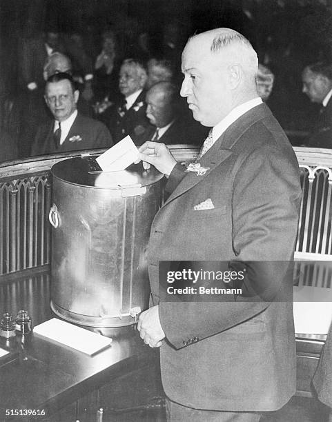 Farley Votes at Electoral College. James A. Farley, Democratic National Chairman, shown as he cast his vote during the one-day session at Albany,...