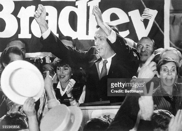 Senator Bill Bradley and his wife Ernestine cheer with supporters after defeating challenger Republican Montclair Mayor Mary Mochary in the general...