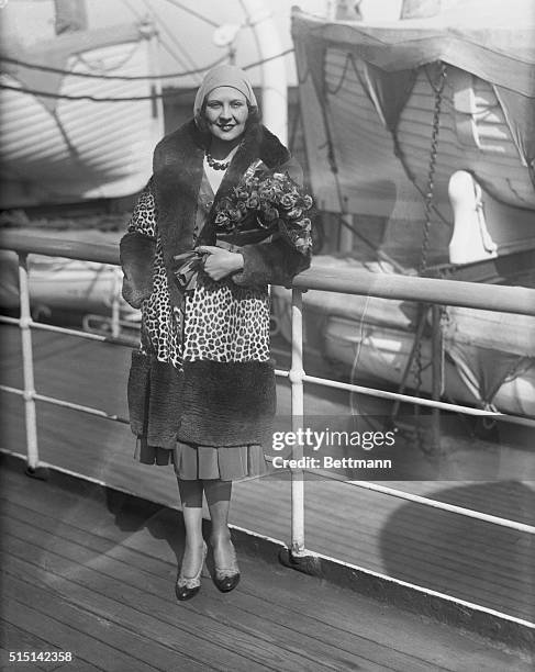 Sails For Tour Of Europe. Lita Grey Chaplin, divorced wife of the famous screen comedian, is seen here, as she sails for a five week tour of Europe....