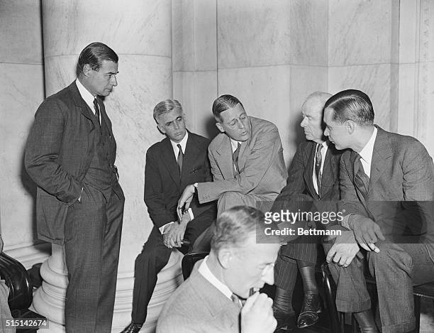 Morgan Partners Confer as Hearing Reopens. A scene in the caucus room of the Senate Office Building, Washington, D.C. On May 31st as the Morgan...