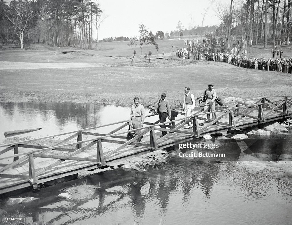 Bobby Jones and Paul Runyan Crossing a Bridge