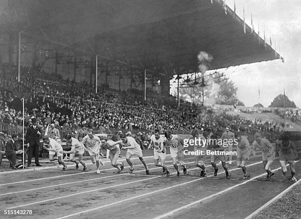 This photo shows the start of the final 1500 meters event, which was won by that wonderful Finn, Paavo Nurmi, who is third from left. The Finn set a...