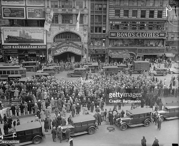 New York, NY-ORIGINAL CAPTION READS: Crowd scene in Times Square showing the Palace Theatre.