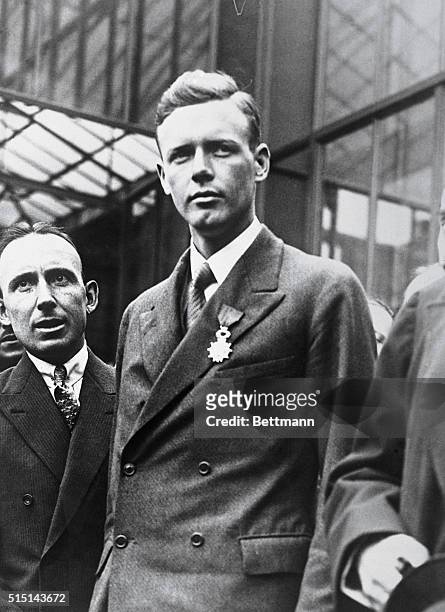 Charles Lindbergh is shown wearing his Legion of Honor Medal presented to him after his arrival at the Le Bourget Airfield.