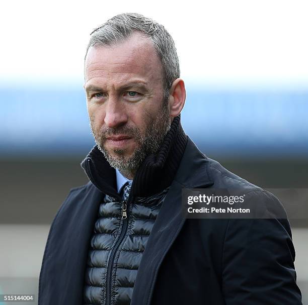 Cambridge United manager Shaun Derry looks on during the Sky Bet League Two match between Northampton Town and Cambridge United at Sixfields Stadium...