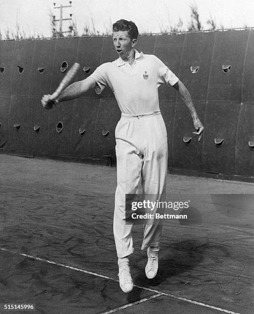 Doesn't mean a thing to Don Budge, the country's number one amateur tennis player, as he delivers a mighty backhand on the tennis courts of the Surf...