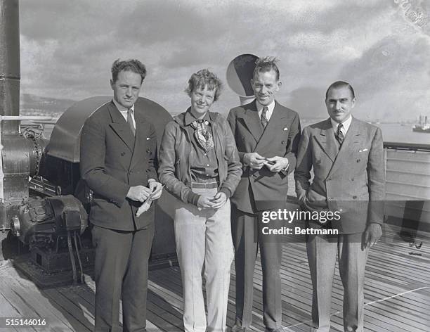 Left to right Captain Harry Manning, Amelia Earhart, Fred Noonan, co-navigator, and Paul Mantz, as they arrived in Los Angeles, California, aboard...