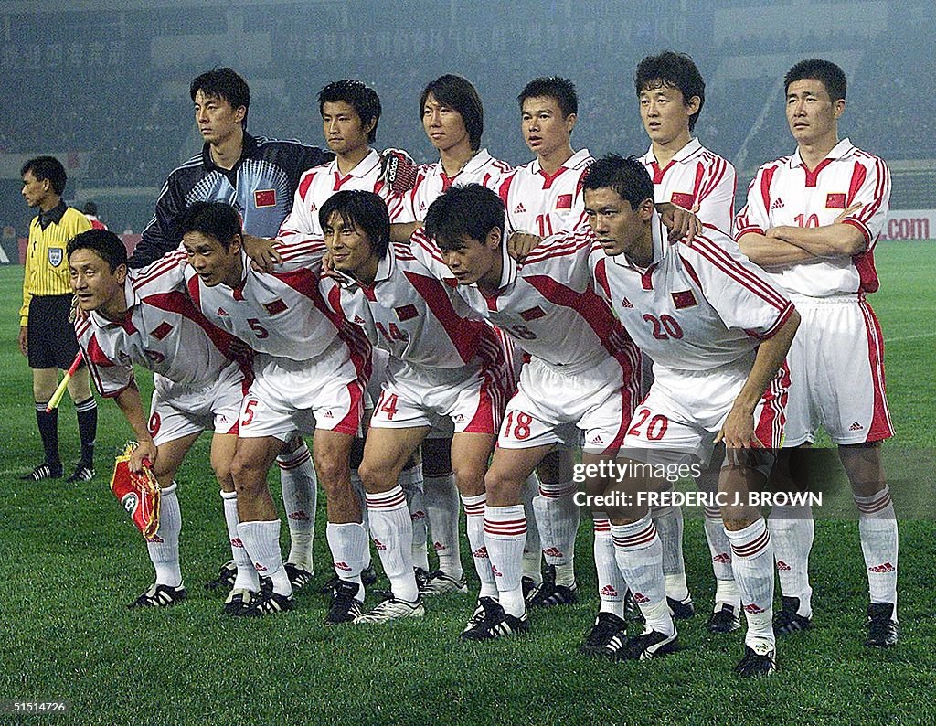 The Chinese national soccer team poses before its