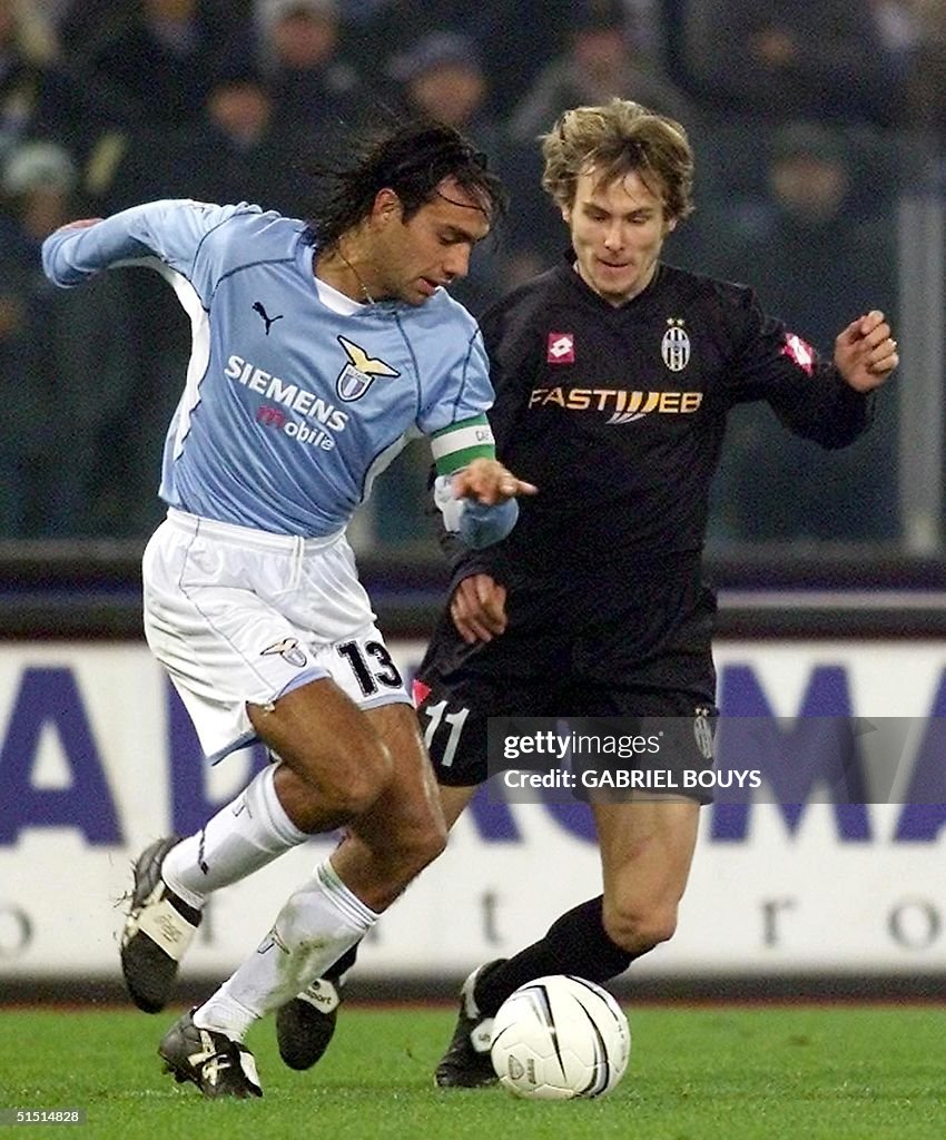 Lazio Rome's defender Alessandro Nesta (L) vies Cz