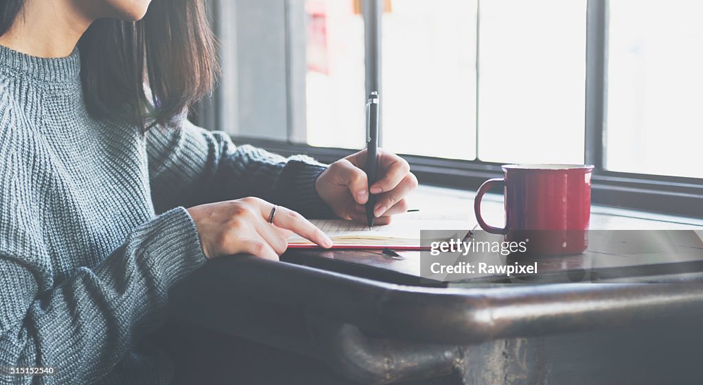 Asian Lady Writing Notebook Diary Concept