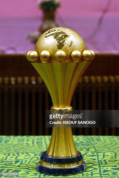 The new soccer African Nations Cup trophy is presented to the press by the African Soccer Confederation 17 January 2002, in Bamako. The CAN 2002 will...