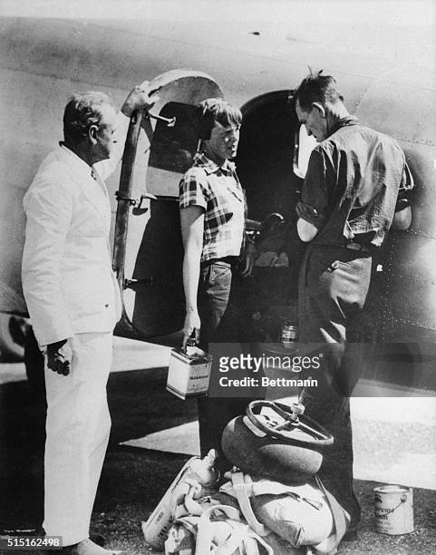 Amelia Earhart and Fred Noonan, are shown in Darwin, Australia.