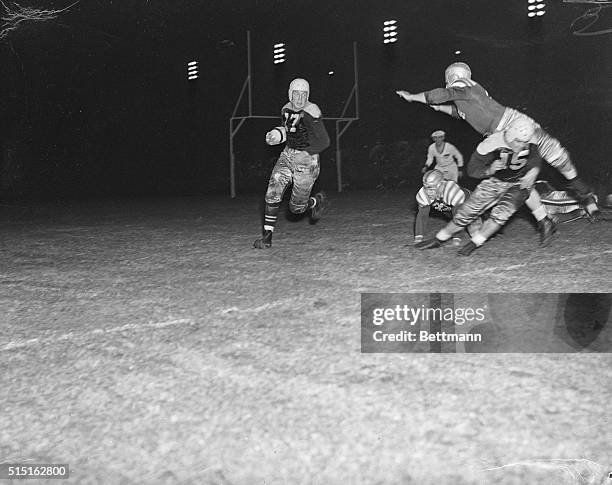 George Sauer, of Green Bay Packers, gets good interference as he tries to skirt right end in the first quarter of the Packers-All Star game in...