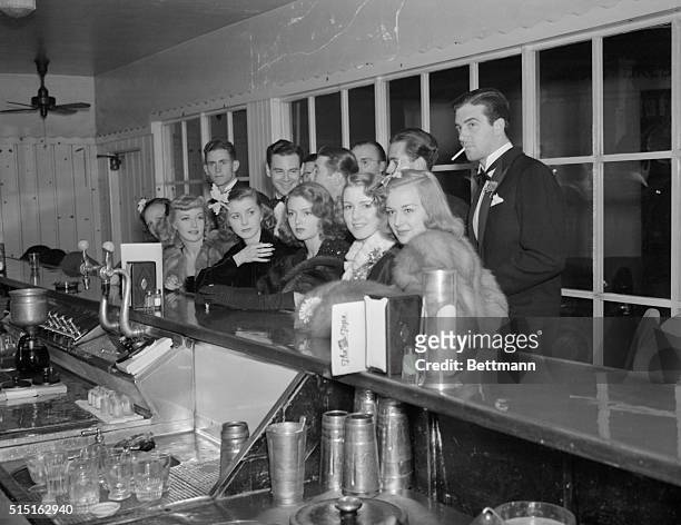 At Actress' Party to Celebrate Her "Discovery". Attending the party given by Lana Turner at the "Tops" Soda Fountain, in Hollywood, California, to...