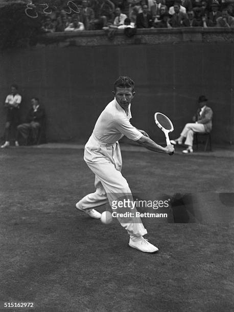 Donald Budge, of California, in action during his match with Yvon Petra in the fourth round of the men's national singles tennis championship at...