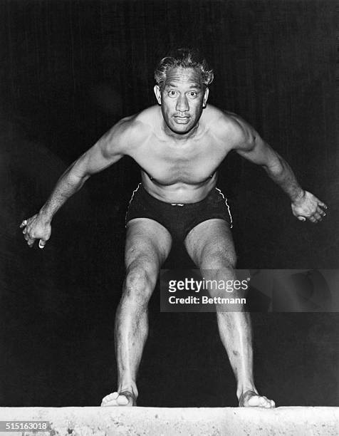 Duke Kahanamoku, veteran Olympic swimmer for the United States, and now Sheriff of Honolulu, Hawaii, as he recently poised himself for another race...