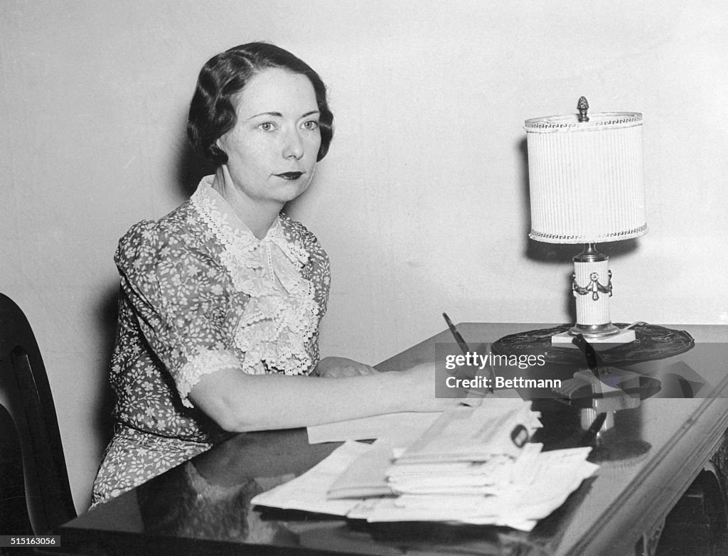 Margaret Mitchell Writing at Her Desk