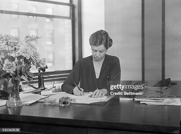 Photo shows Mrs. F. D. Roosevelt, wife of the Democratic gubernatorial candidate, at her desk, preparing campaign matter for her husband. Mrs....