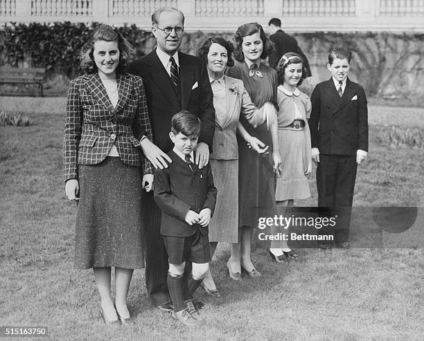 Joseph P. Kennedy, US Ambassador to Great Britain, with his wife Rose Kennedy and five of their nine children in the garden of the American Embassy....