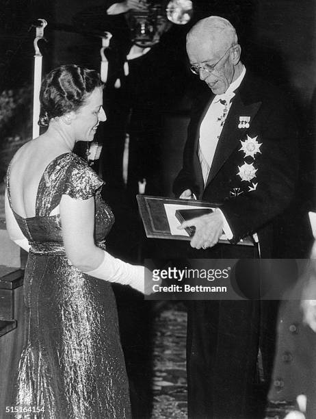 King Gustav of Sweden as he awarded the Nobel Prize for Literature to Pearl Buck, during the recent presentation of prizes at Concert Hall,...