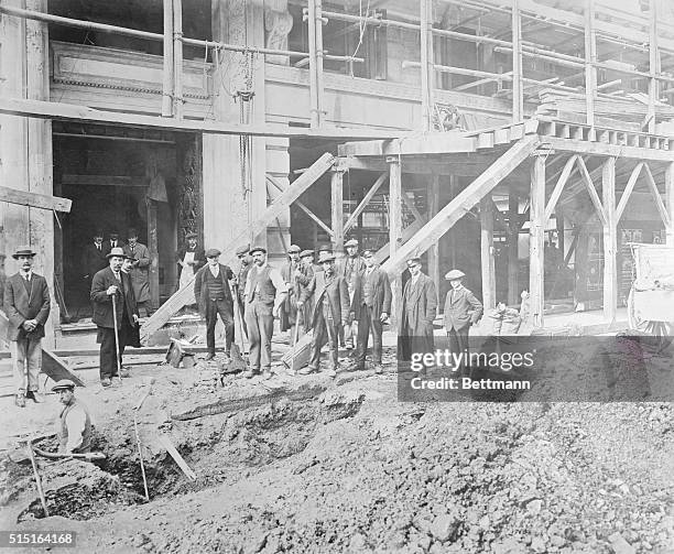 Official photo of the latest Zeppelin raid on the British metropolis. Shows a hole made in the street by a bomb. The explosion broke one of the main...