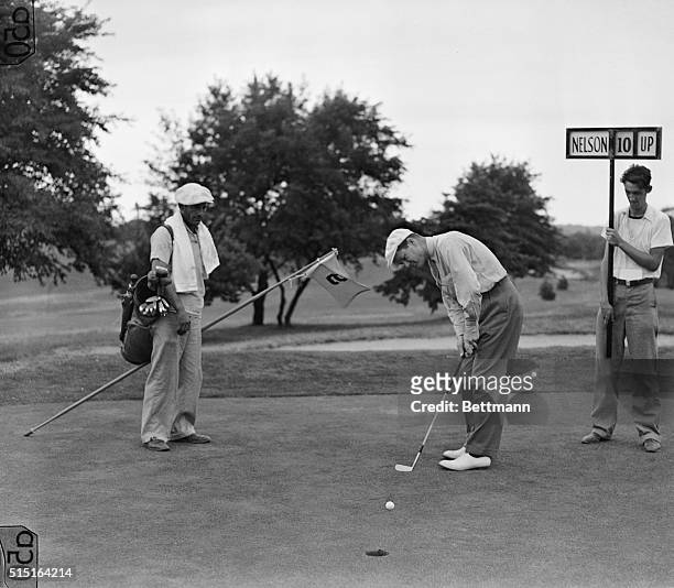 Byron Nelson, U.S. Open Golf Champ who hails from Reading, Pennsylvania, putting on the 9th green of the Pomonok Country Club course where he was...