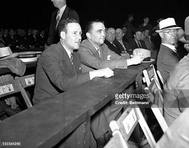 Clyde Tolson of the Department of Justice, and chief G-Man, J. Edgar Hoover, as they attended the Louis-Galento title fight at the Yankee Stadium,...