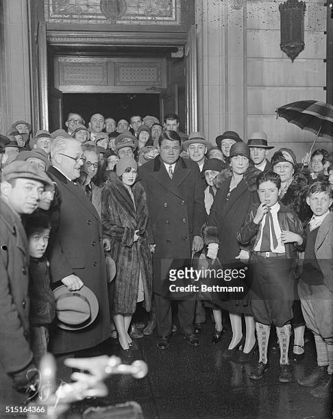 Babe Ruth is shown with his bride, Claire Hodges, leaving St. Gregory's, after wedding ceremony.